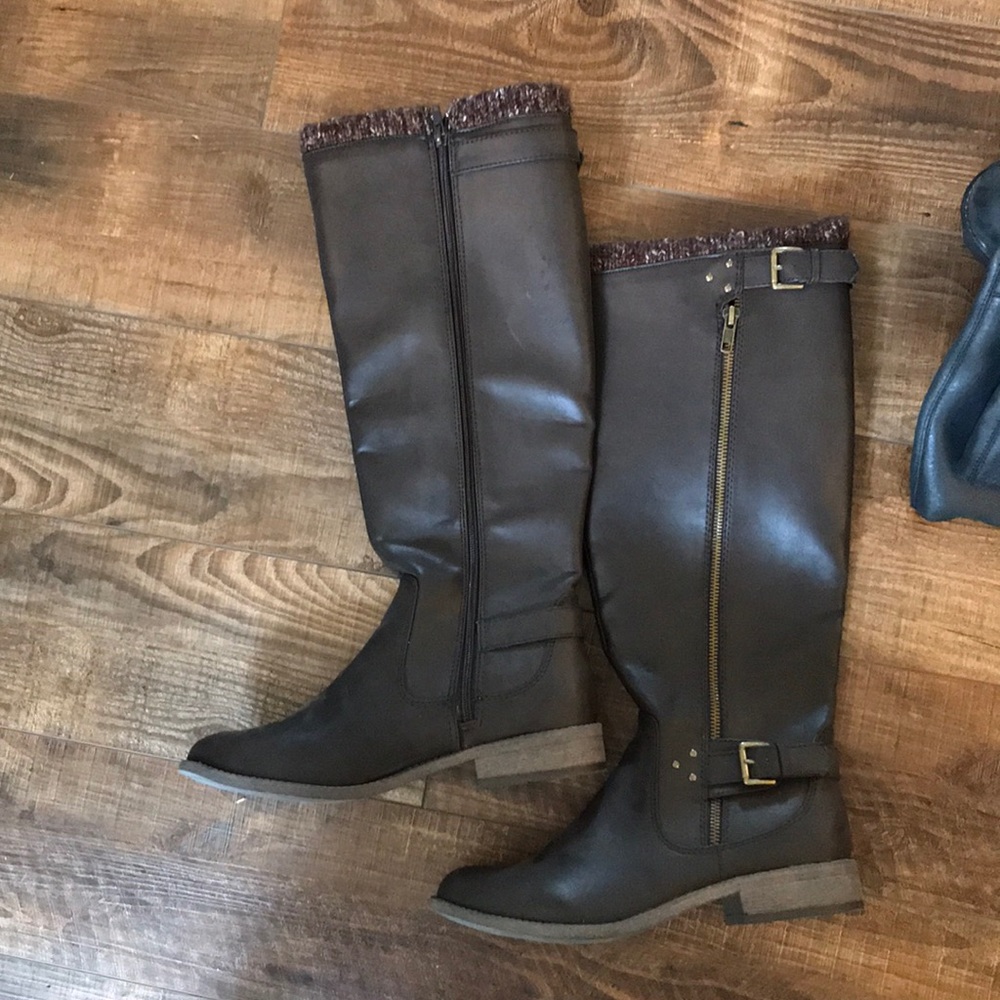 Brown tall booties. Have been worn.